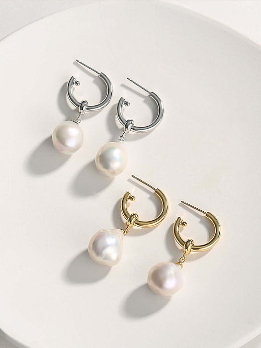 "Elegant Baroque Pearl Earrings" "Silver Drop Earrings with Baroque Pearls" "Chic Baroque Pearl Dangle Earrings" "Unique Silver Earrings with Baroque Pearls" "Statement Baroque Pearl Earrings" "Stylish Silver Earrings featuring Baroque Pearls" "Fashionabl