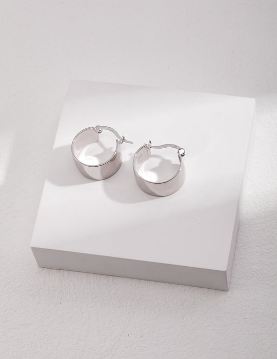 Boucles d'oreilles minimalistes en argent exquis